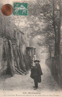 75  - Carte Postale Ancienne De  Montmartre   Un Troubadour Montmartrois Pleurant Sur Les Ruines De La Rue Saint Vincent - Arrondissement: 18