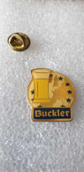 Pin's Bière Buckler étoiles CEE  époxy Plat - Beer