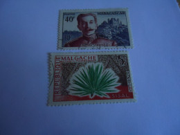 MALGACHE   MADAGASCAR  USED  STAMPS  2 PEOPLES FLOWERS - Madagascar (1960-...)