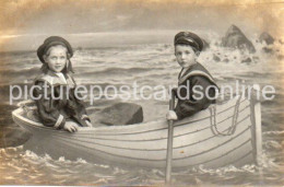 TWO CHILDREN IN FAKE BOAT IN SAILIOR UNIFORMS OLD R/P POSTCARD BY W. J. GREGSON 92 TALBOT ROAD BLACKPOOL - Blackpool