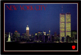 New York City Manhattan Skyline At Night Showing World Trade Center And More - Manhattan