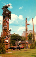 Canada Victoria Thunderbird Park Indian Totem Poles Empress Hotel In Background - Victoria