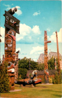 Canada Victoria Thunderbird Park Indian Totem Poles Empress Hotel In Background - Victoria