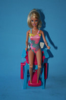 Doll BARBIE BAGNINA CON SEDIA PER SPIAGGIA LIFEGUARD BEACH - Barbie