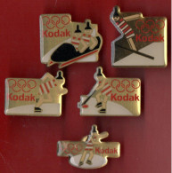 PIN'S . PHOTOGRAPHIE . " KODAK " . JEUX OLYMPIQUES D'HIVER . LOT DE 5 PIN'S - Réf. N°85PNS - - Fotografia