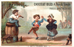 CHROMO CHOCOLAT IBLED PARIS MONDICOURT / LITH. BASTER & VIEILLEMARD JOUEUR DE FLUTE ET DANSEURS - Ibled