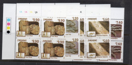 FOSSILS  - ZIMBABWE-  1998-  FOSSILS  SET OF 4 IN CORNER BLOCKS OF 4  MINT NEVER HINGED  SG CAT £18.20 - Fossilien
