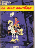 LUCKY LUKE LA VILLE FANTOME   1965 COUVERTURE ET DOS MAUVAIS ETAT  SINON INTERIEUR ASSEZ   BON ETAT - Lucky Luke