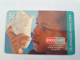 ST MARTIN ECO CARD  €5,- Local Metropole / CHILD WITH SEA SHELL/ XTS TELECOM/ USED    ** 14884 ** - Antilles (Françaises)