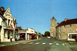 COPM DPT 50 MONTMARTIN SUR MER LE BOURG ET L EGLISE EN 1982 - Montmartin Sur Mer