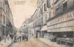 CPA 93 BAGNOLET / LA RUE SADI CARNOT / MAGASIN CHOCOLAT VINAY / Cpa Rare - Bagnolet