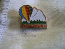 Pin's Montgolfiere  Chocolat TOBLERONE - Luchtballons