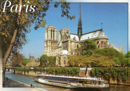 CPM - F - PARIS - BATEAU MOUCHE SUR LA SEINE DEVANT NOTRE DAME - Notre Dame De Paris