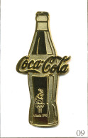 Pin's J.O Atlanta 1996 - Bouteille Coca-Cola. Taille : 61 X 28 Mm. Est. ©️1988 All Rights Reserved. Métal Doré. T612-09 - Coca-Cola