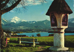 AUSTRIA, CARINTHIA, MARTERL AM FAAKERSEE WITH MITTAGSKOGEL, MOUNTAIN, LAKE - Faakersee-Orte