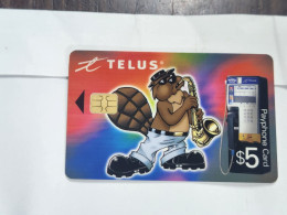 CANADA-(CA-TEL-Q10187)-castor With Saxophone-TELUS-($5)-(chip Left Side)-(14)-(1069740)-(tirage-1900)-used Card - Canada