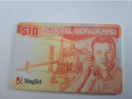 SINGAPORE $ 10,- / PREPAID /SINGTEL/ THICK CARD /BRIDGE/EIFET TOWER/   / USED   ** 15469** - Singapore
