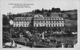 Eglise Neuve D'Entraigues - Les Ecoles Et Le Monument Aux Morts   - CPSM °J - Aigueperse