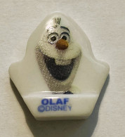 Fève PLATE DISNEY OLAF Série La Reine Des Neiges  / 33NAT - Geschichte