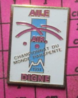 1518A Pin's Pins / Beau Et Rare / SPORTS / PARACHUTISME PARAPENTE AILE AIR DIGNE CHAMPIONNAT DU MONDE DE PARAPENTE - Fallschirmspringen