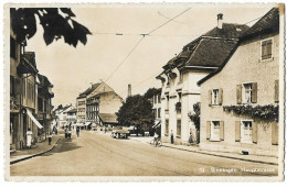 BINNINGEN: Foto-AK Hauptstrasse Mit Lkw, Tramschienen, Uhren Pelletier... ~1940 - Binningen