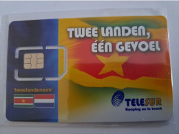 SURINAME  TELESUR   SIMCARD /TWEELANDENSIM SURINAME/NETHERLANDS  MINT IN WRAPPER (R) DIFFERENT  NEW CHIP !!  ** 15535** - Surinam