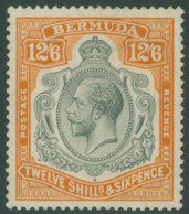 1924-32 MSCA 12/6d Grey & Orange Showing The 'break In Lines Below Left Scroll' Variety, M (usual Toned Gum), SG.93e. (1 - Other & Unclassified