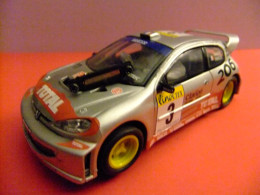 SCALEXTRIC PEUGEOT 206 WRC ACCESORIO IMAN Y TORNILLOS - Circuitos Automóviles