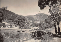 CPSM 63  LE MONT DORE VUE PANORAMIQUE PRISE DES LACETS DE LA ROUTE DE BESSE .. Grand Format 15 X 10,5 Cm - Le Mont Dore