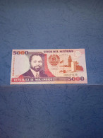 MOZAMBICO-P136 5000M 16.6.1991 UNC - Mozambico