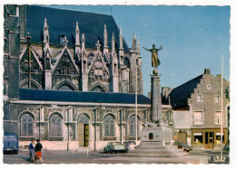 TIENEN - TIRLEMONT - Achterzicht Van Der Kerk O.L.V. Ten Poel En Het Standbeeld (1914-1918). - Tienen