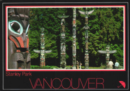 VANCOUVER, STANLEY PARK, TOTEM PARK, CARVED TOTEMS, INDIANS, BELLA PRINTS, RED UMBRELLA, CANADA - Vancouver