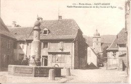 SAINT-AMARIN (68) Vieille Fontaine Surmontée Du Coq Gaulois Et L'Eglise - Saint Amarin