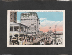 125314     Stati  Uniti,  Rolling  Chair Scene, Front Of Breakers  And  St. Charles Hotel,    Atlantic  City, N. J., NV - Atlantic City