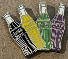 QUATRE BOUTEILLES DE COCA-COLA - NOIRE - JAUNE - VERTE - VIOLETTE - EGF - COKE - COCA -       33) - Coca-Cola
