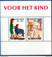 Suriname 1991 Child Wellfare Block MNH 2108.2266 Handicapped, Wheelchair - Autres & Non Classés