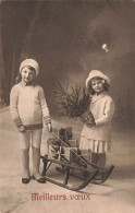 FÊTES ET VOEUX - Noël - Deux Enfant Avec Des Cadeaux Sur Leur Traineau - Carte Postale Ancienne - Altri & Non Classificati