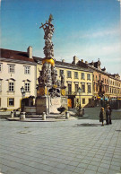 Baden Bei Wien - La Colonne De La Sainte Trinité - Au Second Plan, La Maison Impériale (XVIIIe Siècle) - Baden Bei Wien