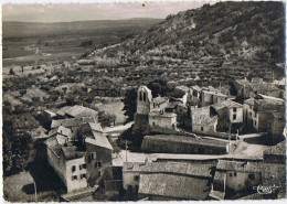 CPM..84..ROBION..VAUCLUSE..VUE AERIENNE SUR LE CENTRE DU VILLAGE ET L'HORLOGE - Robion