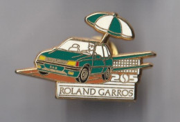 PIN'S    THEME   ARTHUS BERTRAND TENNIS ROLAND GARROS PEUGEOT 205 - Banques