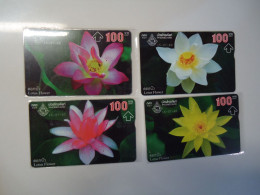 THAILAND USED CARDS  OLD MAGNETIC SET 4 FLOWERS - Blumen