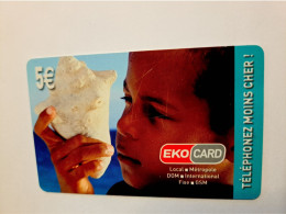 ST MARTIN ECO CARD  €5,- Local Metropole / CHILD WITH SEA SHELL/ XTS TELECOM/ USED    ** 16026 ** - Antilles (Françaises)