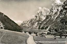 13920851 Kloentalersee_Kloenthalersee_GL Mit Pragelstrasse Und Glaernischkette - Sonstige & Ohne Zuordnung