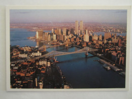 EXOTIC LOWER  NEW YORK AERIAL VIEW SHOWING  MANHATTAN BROOKLYN BRIDGES SPANNING THE EAST RIVER - Manhattan