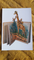 CPM GIRAFE DECOUPI SORTANT D UN LIVRE LIVRES EN FORME DE POP UP EXPO TOULOUSE 2010 - Giraffes