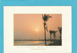 CPM.   COUCHER DE SOLEIL SUR LOME-PLAGE .  CARTE ECRITE AU VERSO LE 10-2-1999 - Togo