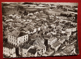 CPSM Grand Format - En Avion Au Dessus De..   Montpezat De Quercy -(T.-et-G.) - La Mairie Et La Place - Montpezat De Quercy