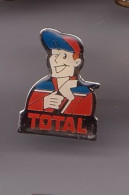 Pin's  Total Le Pompiste Réf  1031 - Carburantes