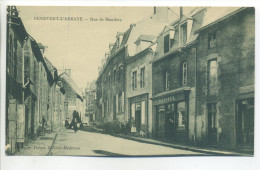 CPA (23 - Creuse) - BENEVENT L'ABBAYE - Rue De (Montlery) Monthléry - Commerces, Animation - Ed. Prévot - Peu Commune! - Benevent L'Abbaye