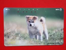 T-153 - JAPAN -JAPON, NIPON, TELECARD, PHONECARD, NTT JP 411-208, Dog, Chien - Japon